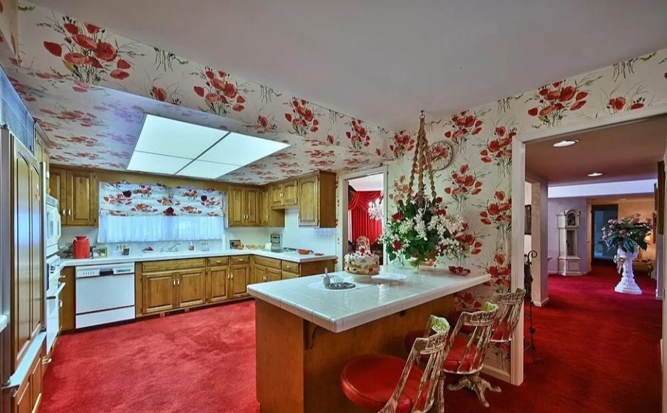 The same design also lines the kitchen ceiling and surrounding walls