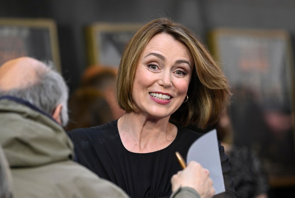 Keeley Hawes stopped to greet fans as she arrived