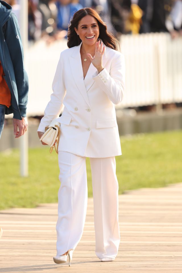 Meghan made a dazzling entrance at the Invictus Games in Holland yesterday