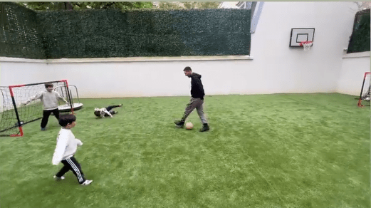 Messi took a garden kickabout with his children rather seriously