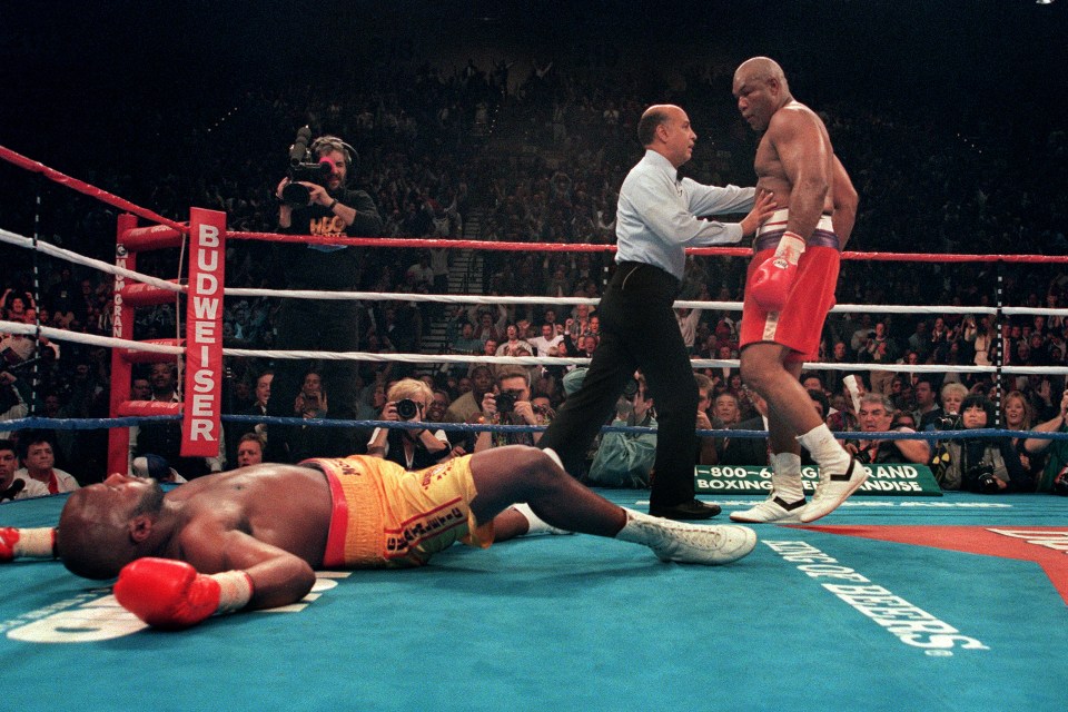 George Foreman KOs Michael Moorer to become oldest heavyweight champ