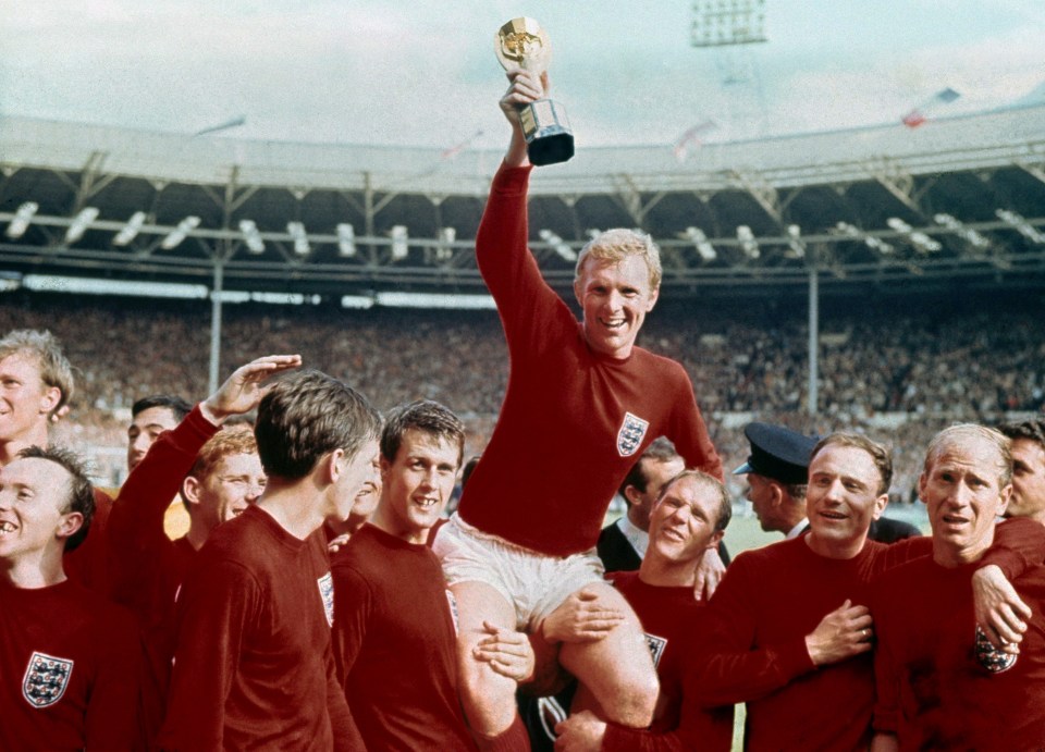 Skipper Bobby Moore holds aloft the World Cup at Wembley in 1966, after England launched the tournament on day one