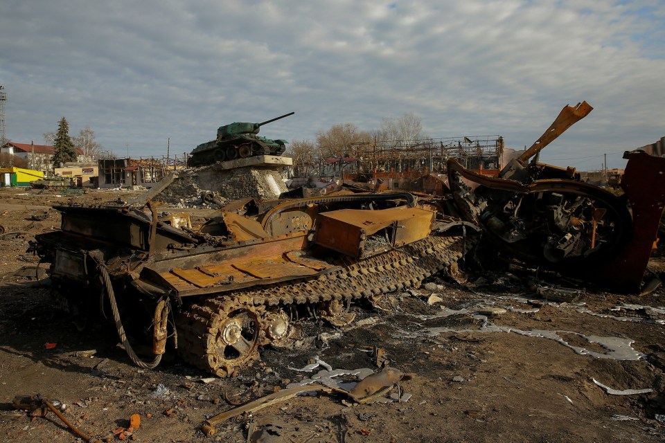 A destroyed Russian tank is seen amid Putin's attack on Ukraine continues