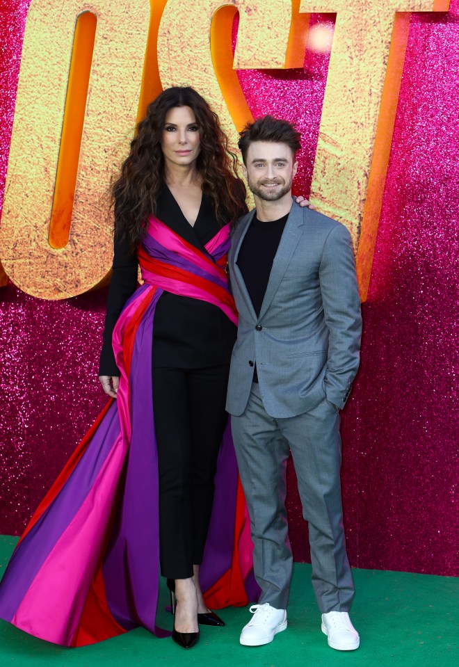 Sandra Bullock towered over Daniel Radcliffe at The Lost City premiere