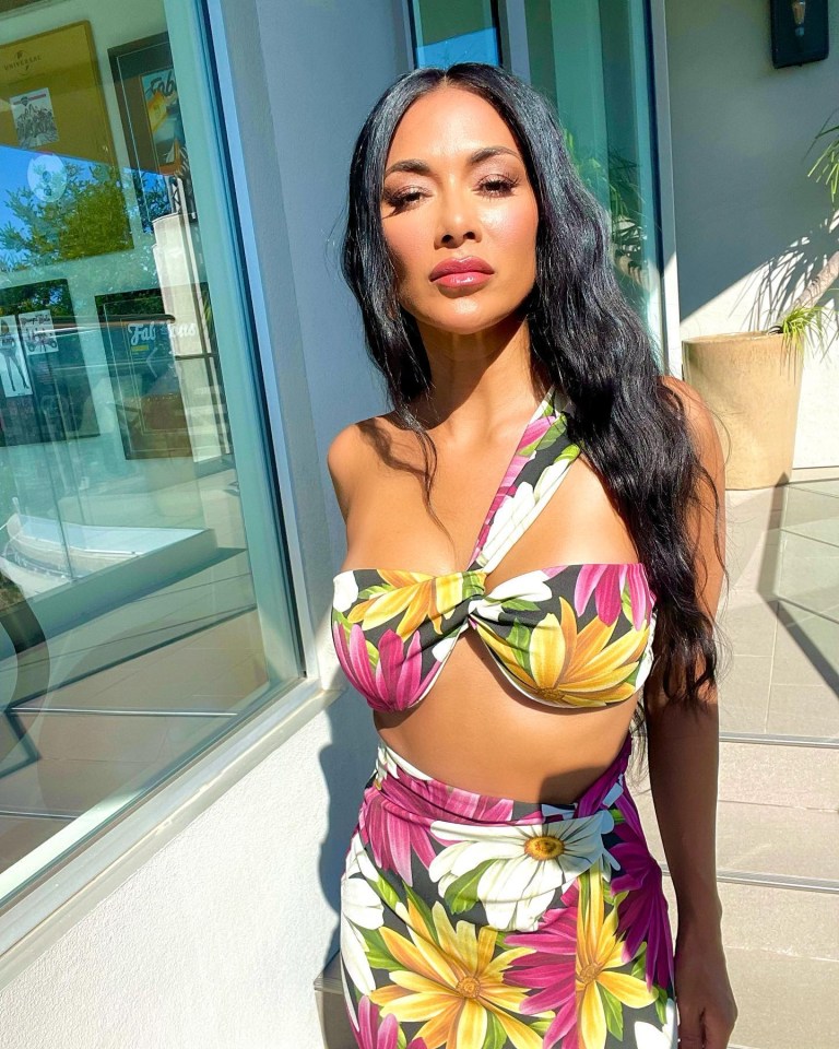 Nicole Scherzinger posed for this snap, describing the look as ‘Channelling Polynesian warrior goddess vibes’