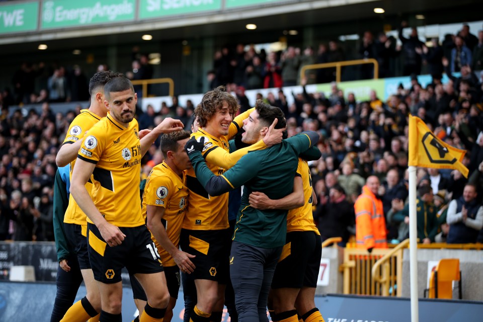 Pedro Neto & Co celebrate Ashley Young's own goal making it 2-0