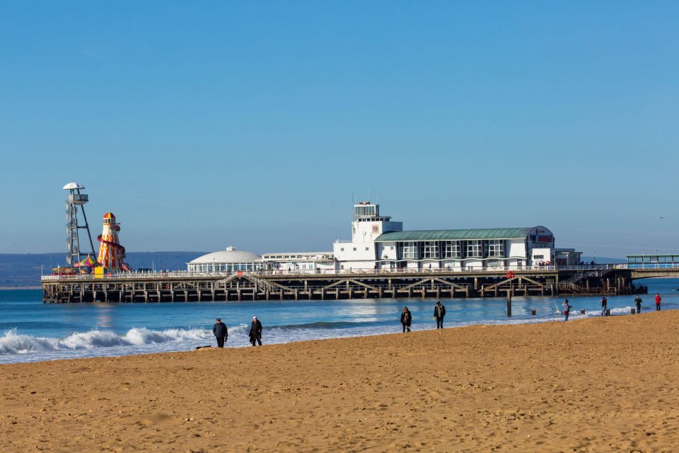 Visitors head to Bournemouth beach to enjoy the sunshine