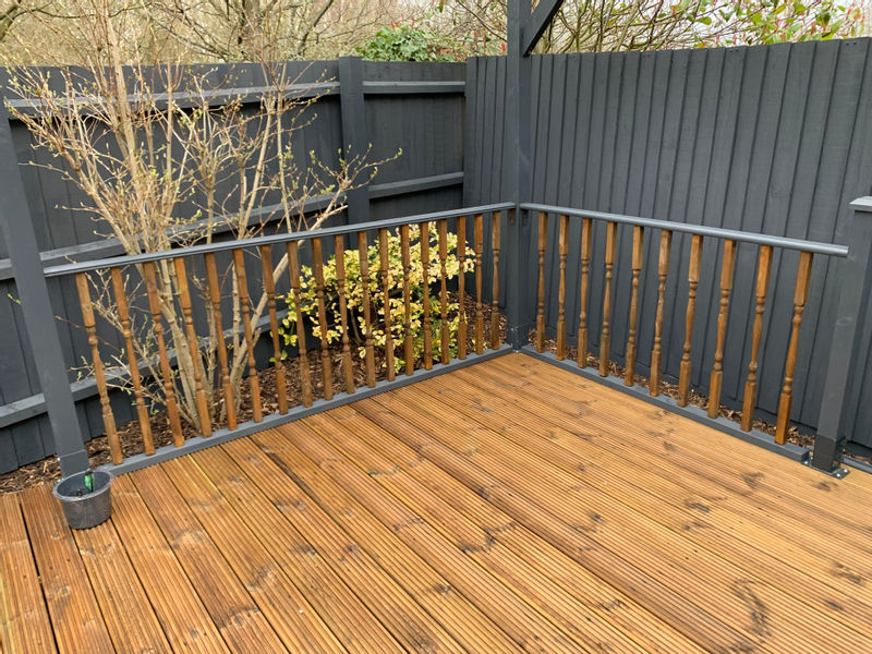 She used a neighbour's banisters  as railings for the decking