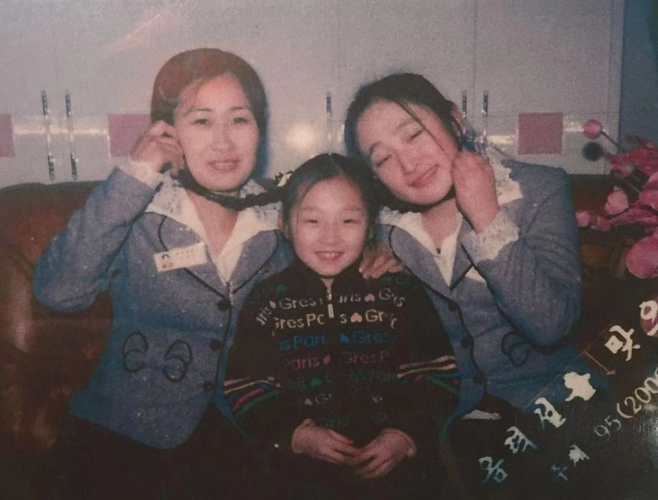 Evelyn with two women employed by her mother