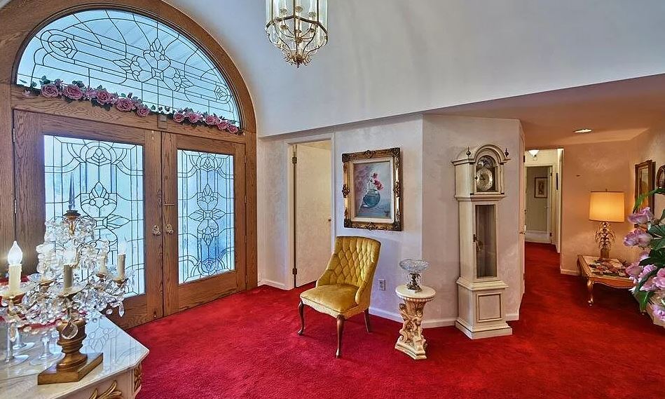 The same carpet is used in the entranceway to the home