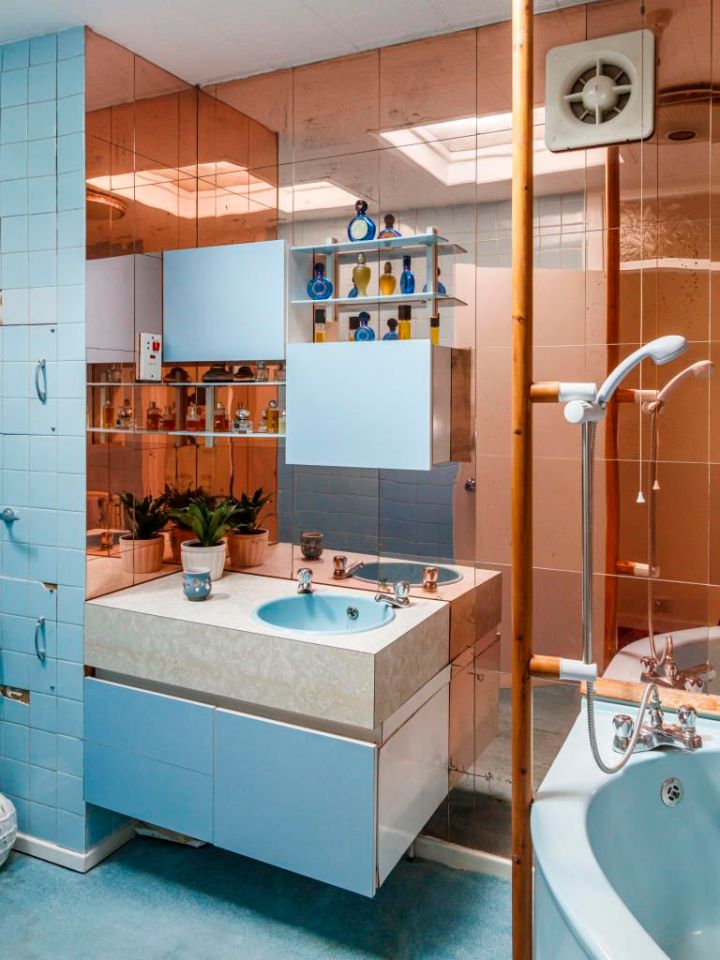 One bathroom comes with copper tiles