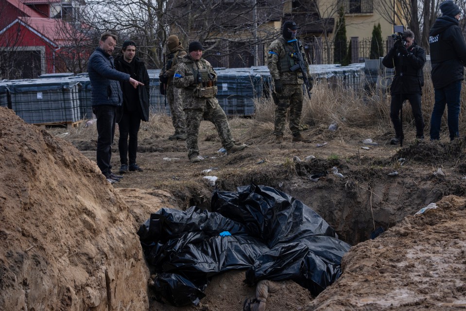 Mass graves have cropped up as hundreds of civilians were brutally killed