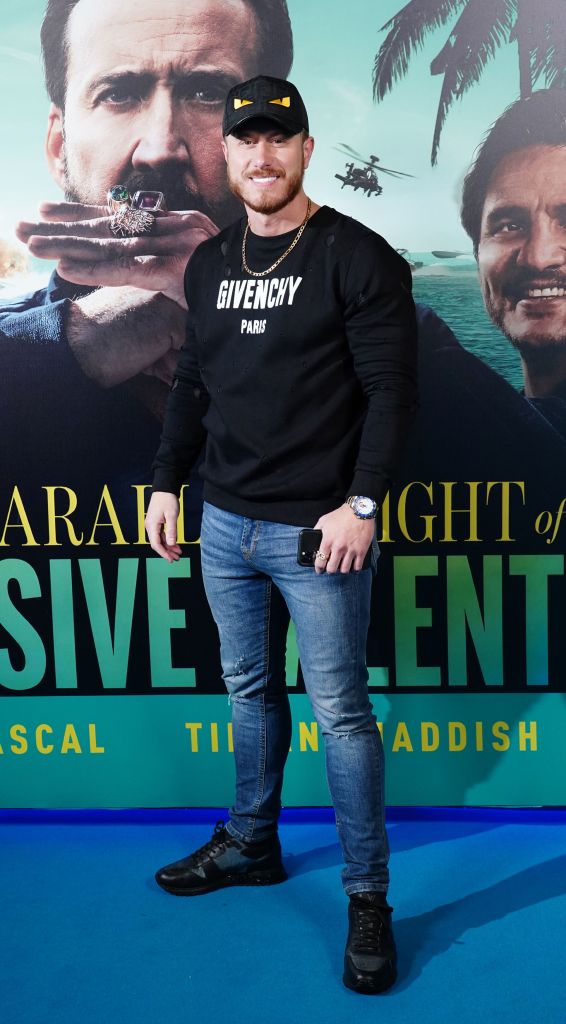 Kris Boyson, who looked suave at The Unbearable Weight of Massive Talent premiere at Cineworld, has insisted they were not there at the same time