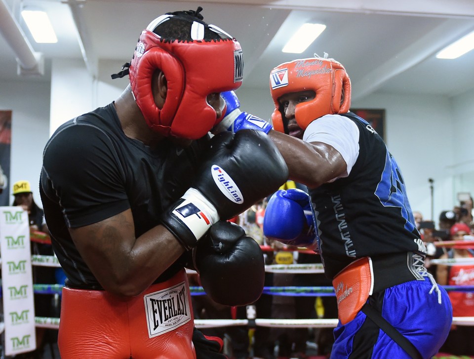 Don Moore sparring with Floyd Mayweather in 2015