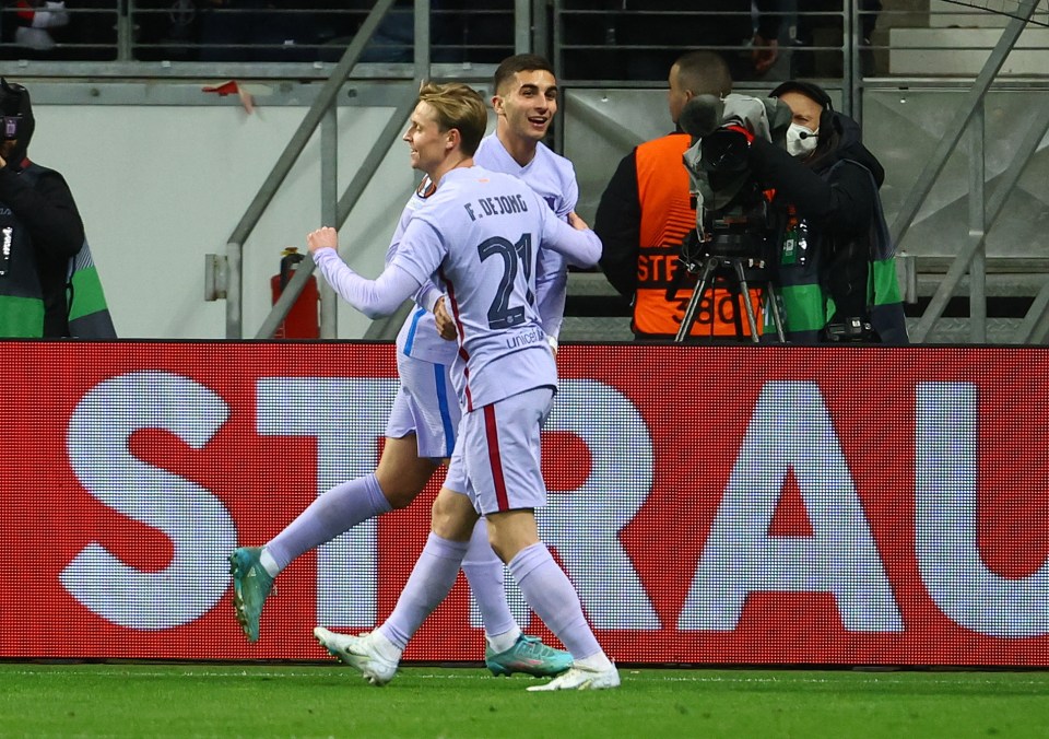 Substitute Frenkie de Jong celebrates with Ferran Torres after setting up the ex-Man City star