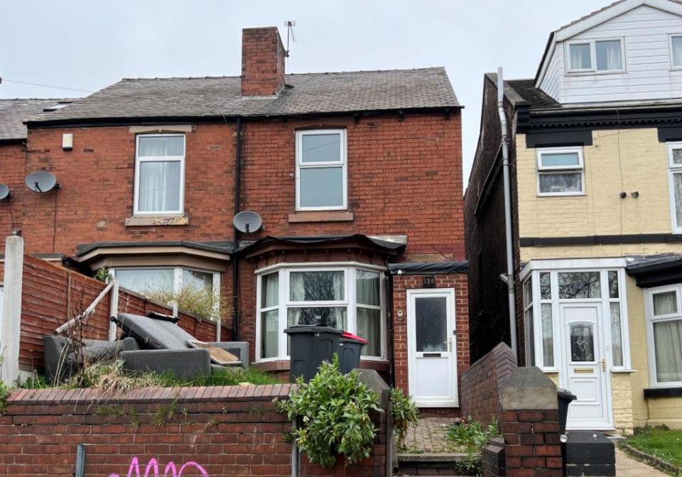 The property's overgrown front garden is no better, with rubbish dumped on the lawn