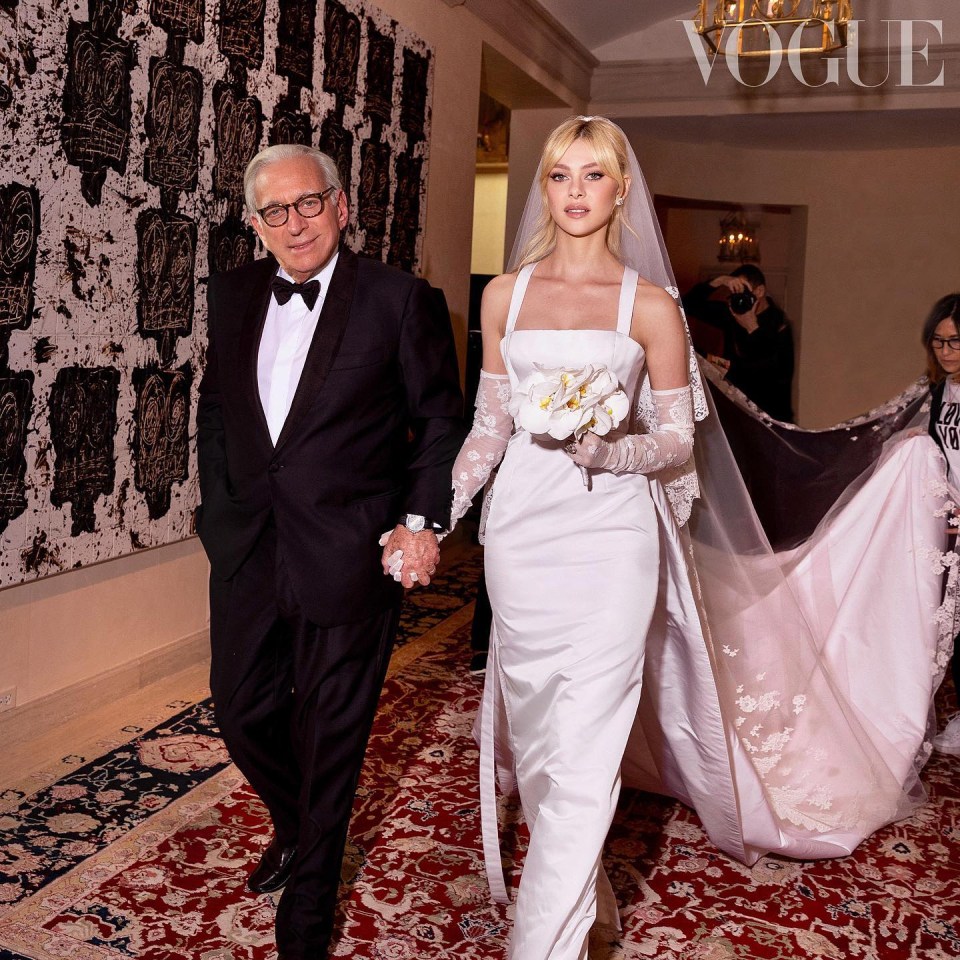 Nicola with her billionaire father Nelson on her wedding day