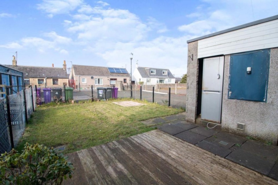 The police station straddles the decent sized front garden