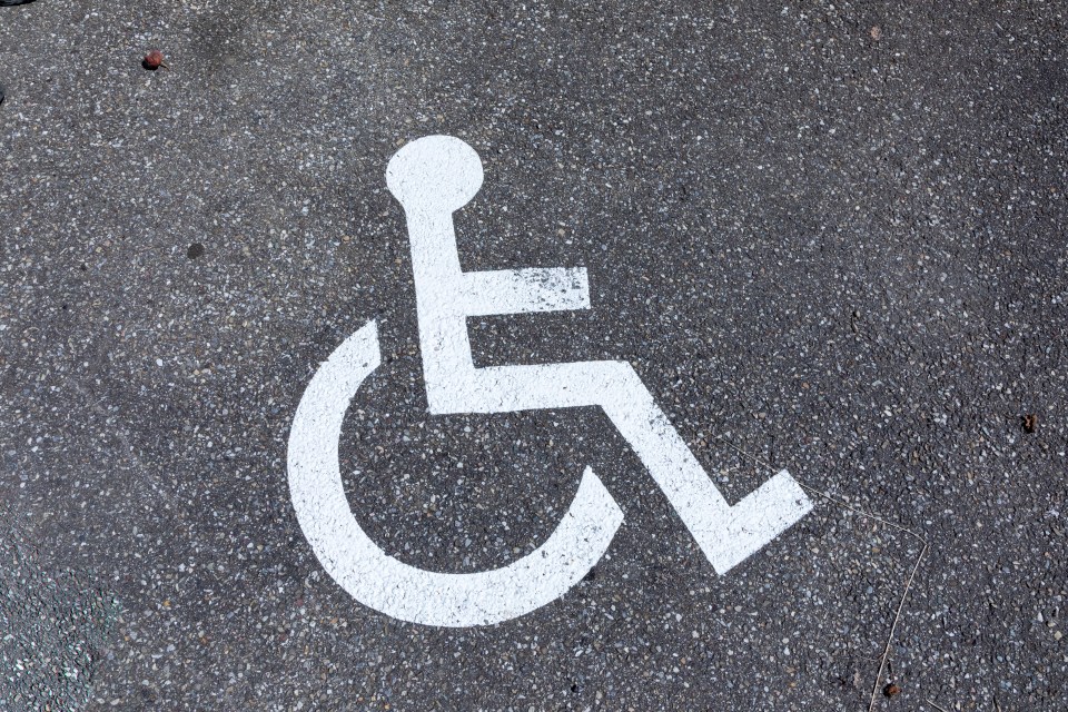 The man was refused a disabled bay outside his home as his neighbour already has one