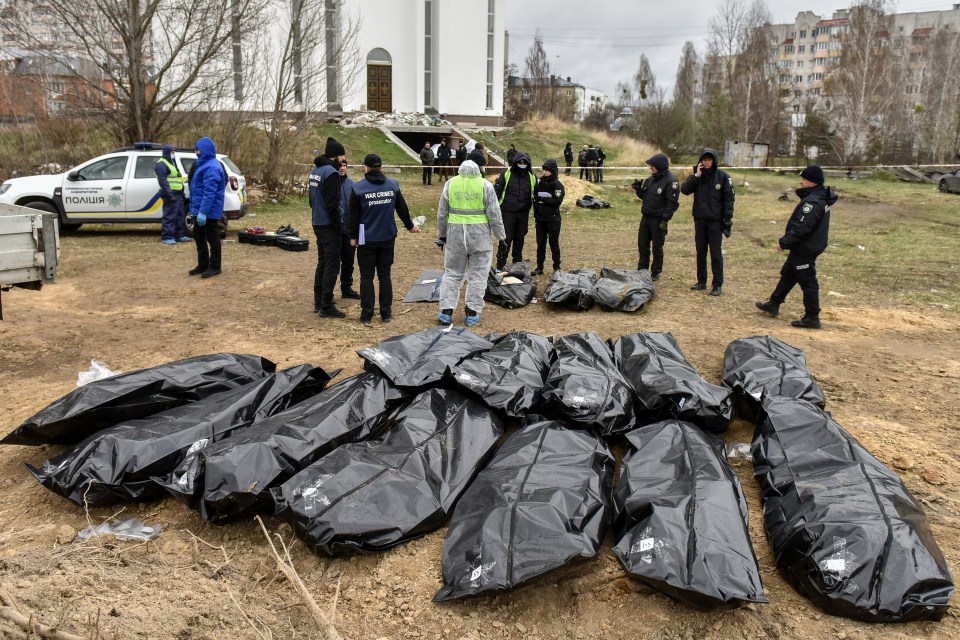 Bodies are exhumed from a mass grave discovered near the St. Andrew and All Saints Church in Bucha