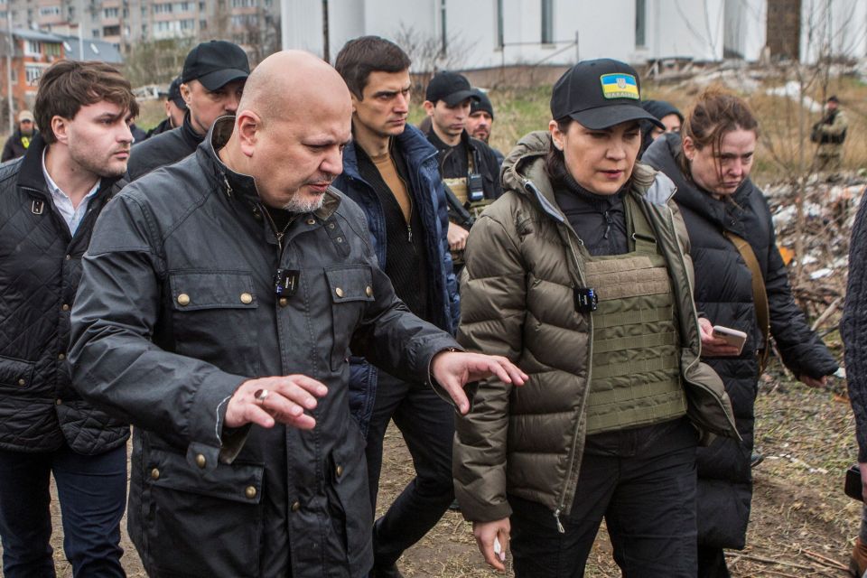 International Criminal Court (ICC) Prosecutor Karim Khan and Ukraine’s Prosecutor General Iryna Venediktova visit a site of a mass grave