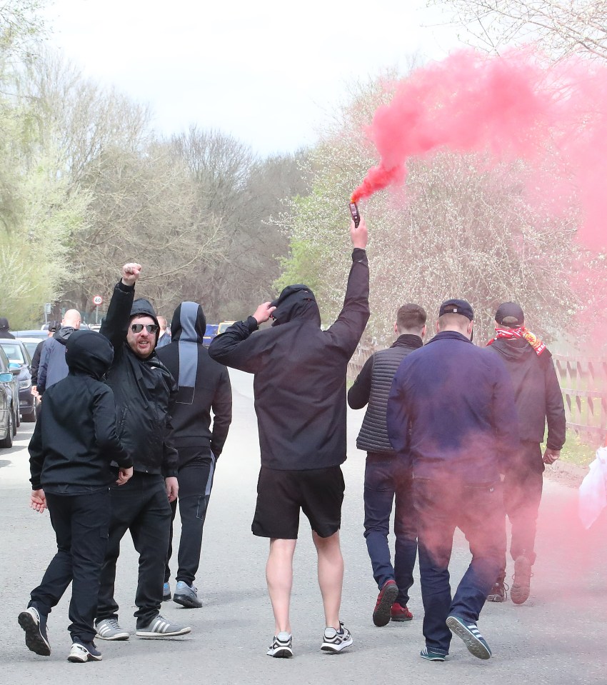 Supporters brought red flares with them as anger mounts