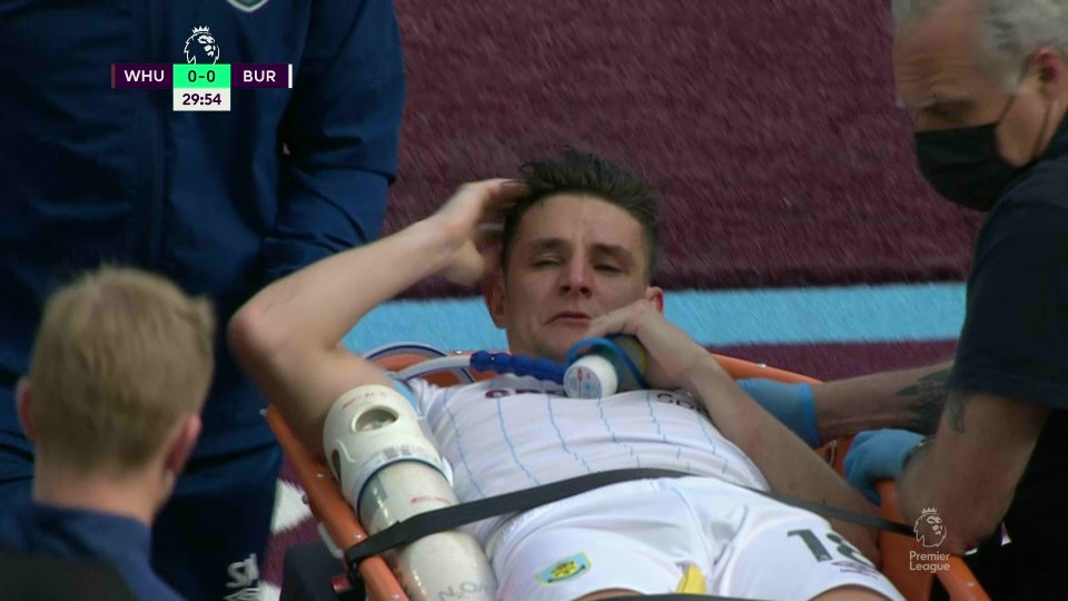 Ashley Westwood was taken off the pitch on a stretcher and oxygen mask