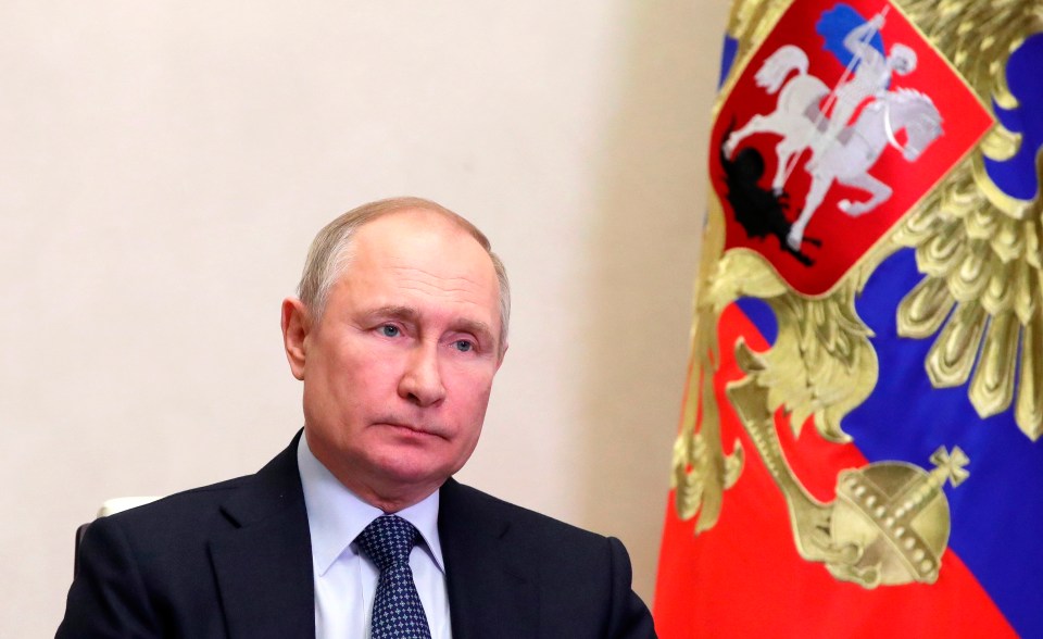 Putin scandalously honoured the the regiment believed to be responsible for 'mass heroism'