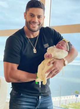 Hulk holds his new-born baby