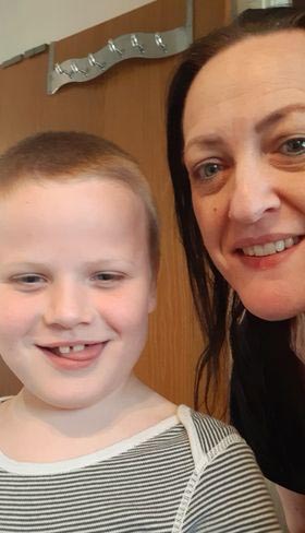 Miranda Tredinnick and her autistic son Ace, 8, are waiting for a new back door