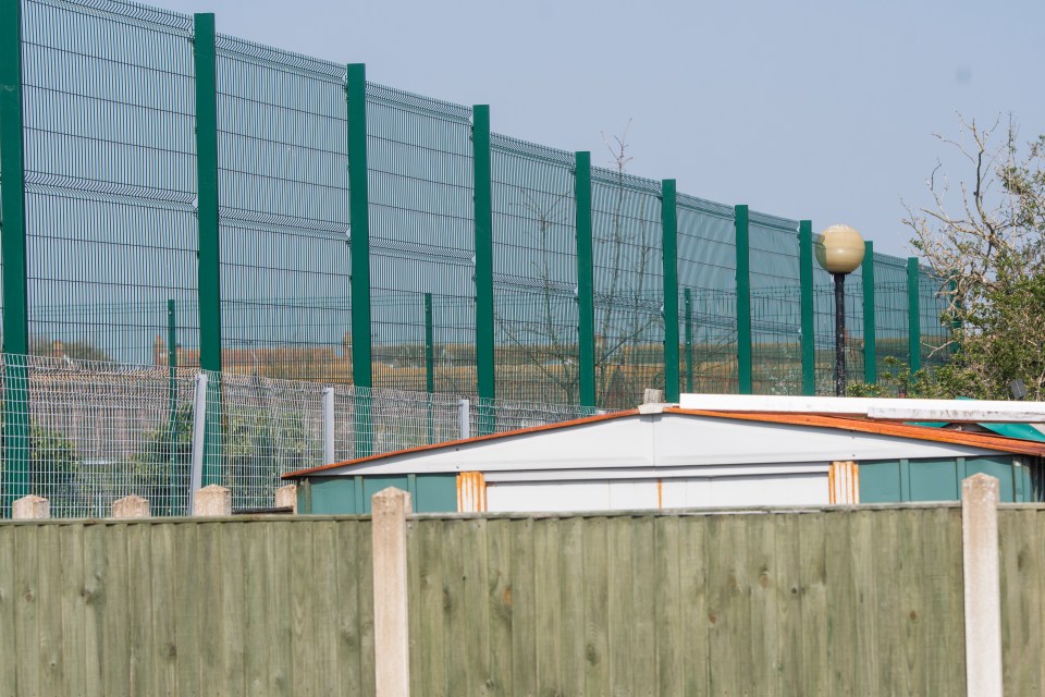 At 4.2 metres tall, the fence makes locals feel like prisoners in their own homes