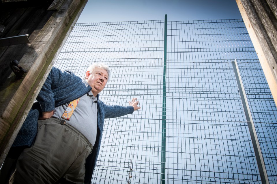 Local resident Rob Moore says the fence at the school has ruined his view