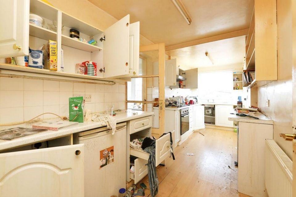 The kitchen was left with cupboards open and crockery everywhere