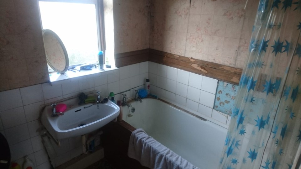 The bathroom was lacking character and the couple had to clear out the previous owner's belongings