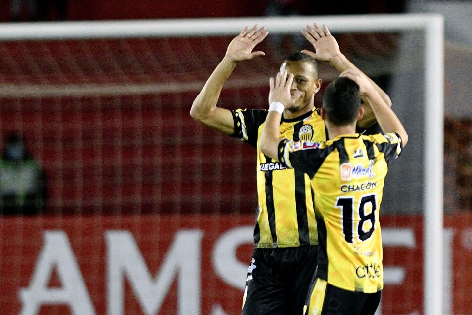 Anthony Uribe (L) celebrates scoring and stealing his goalkeeper's goal.