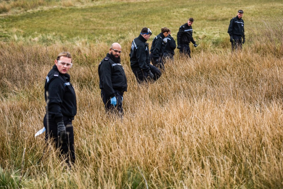 Police search teams continue to search areas in Gisburn Forest, Lancs., on Wednesday