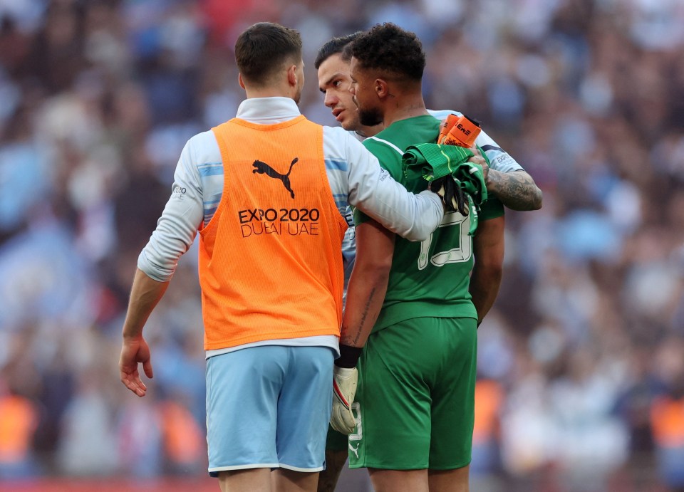 Ederson and Ruben Dias consoled Steffen after the final whistle