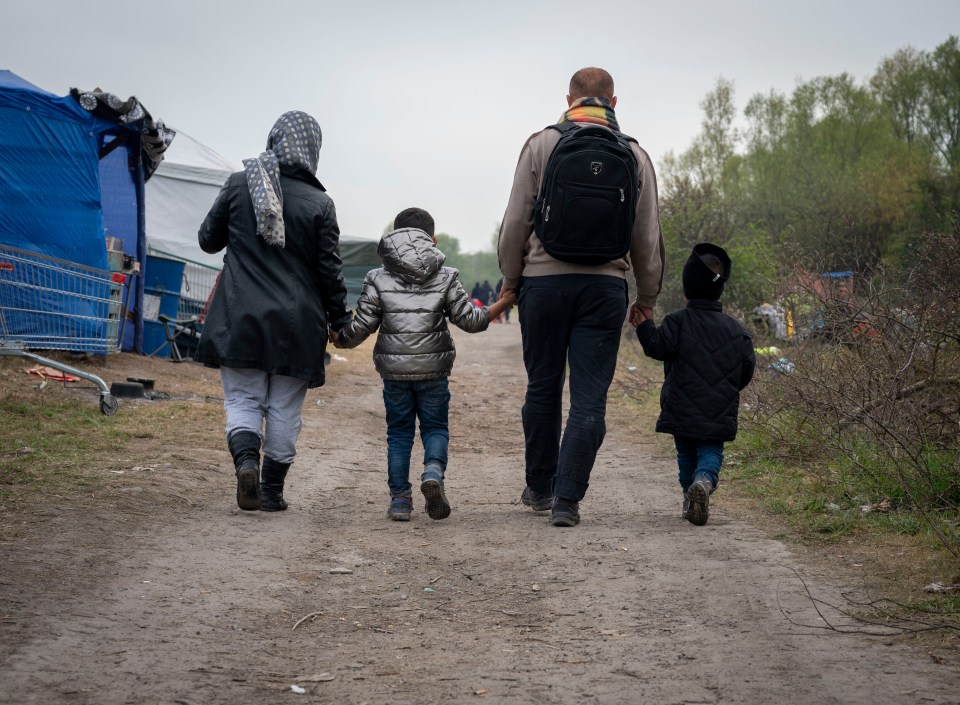 Iraqi Kurds Sarkawt Hakem, 34, his wife Sakar Ahmad and their two children Donar, 6, and Dahen, 3