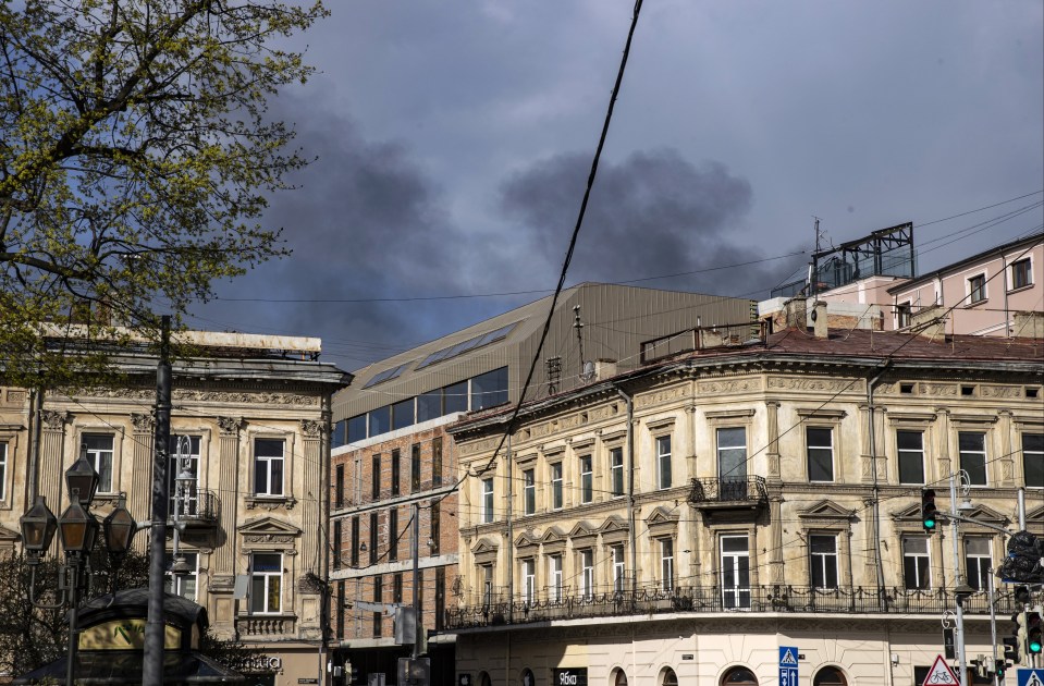 Smoke can be seen rising across the city