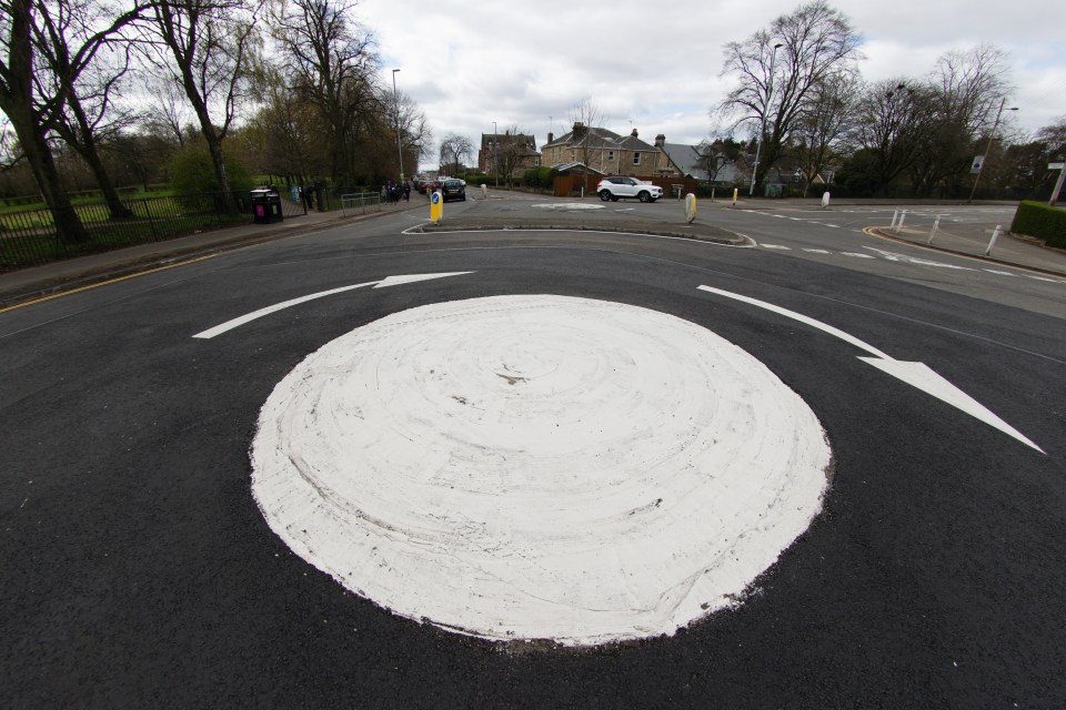 A mini-roundabout is often a challenge for drivers