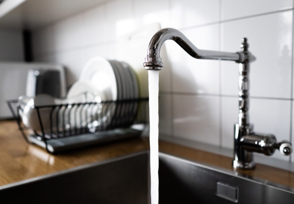 Turning the temperature of your hot water tap down can save you money