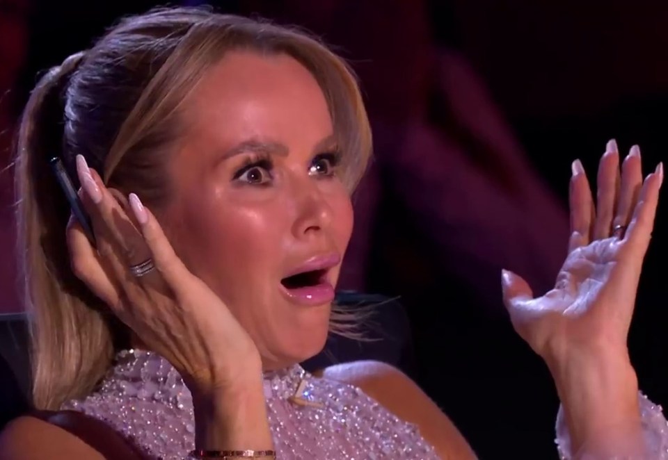 Amanda Holden is seen throwing her hands in horror at the act