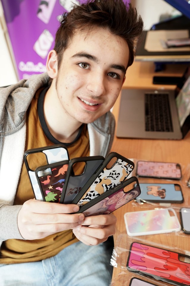 He uses a printing press to transfer designs on to blank protectors he buys online