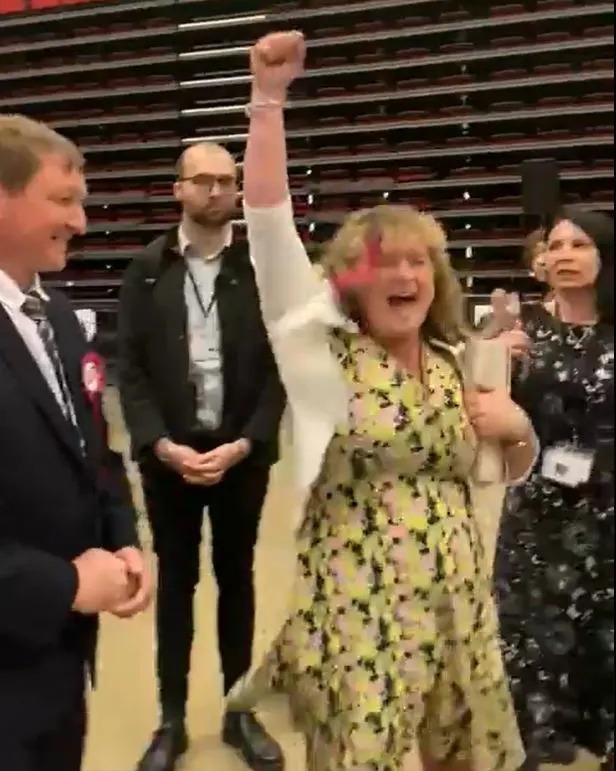 Social Democratic Party’s Wayne Dixon's wife jumping for joy at the election result