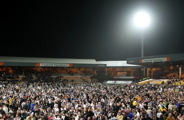 There were chaotic scenes as Vale supporters invaded the pitch after beating Swindon