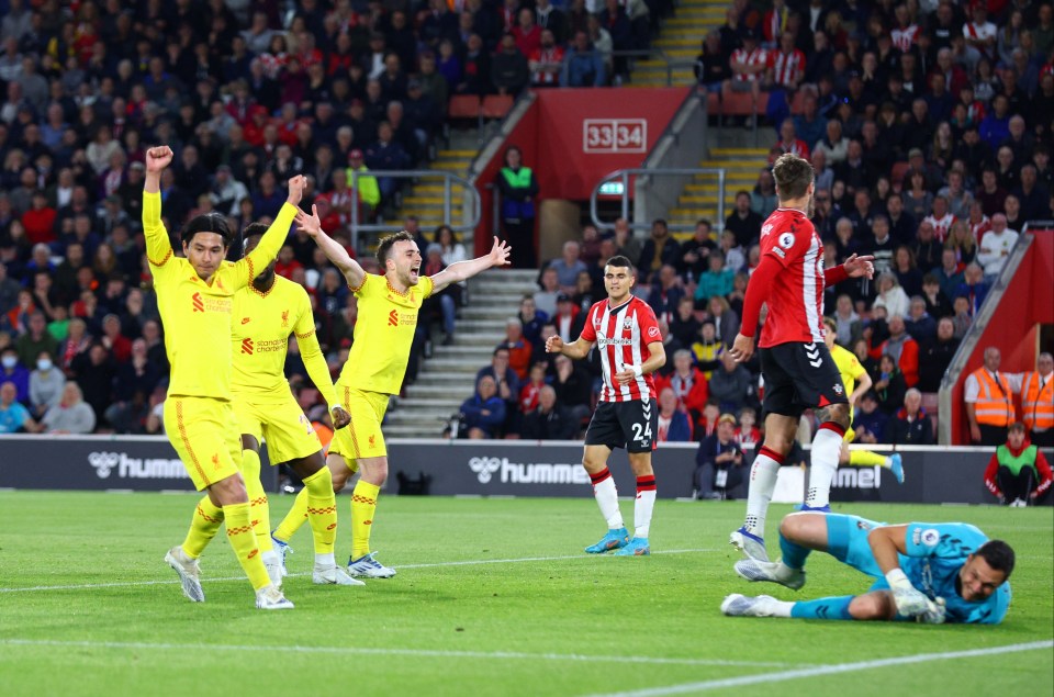 Liverpool celebrate their late winner