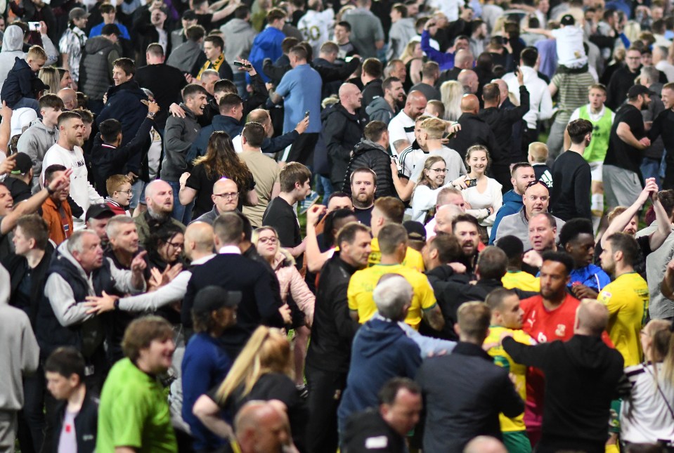 Swindon Town players were mobbed and assaulted by Port Vale fans at the end of their semi-final play-off defeat