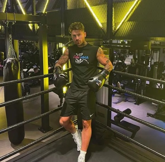 Robbie's training for Celebrity MMA, which happens next month