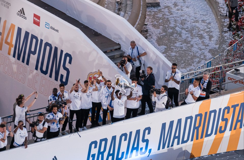 The players took it in turns to lift the trophy in front of the fans watching