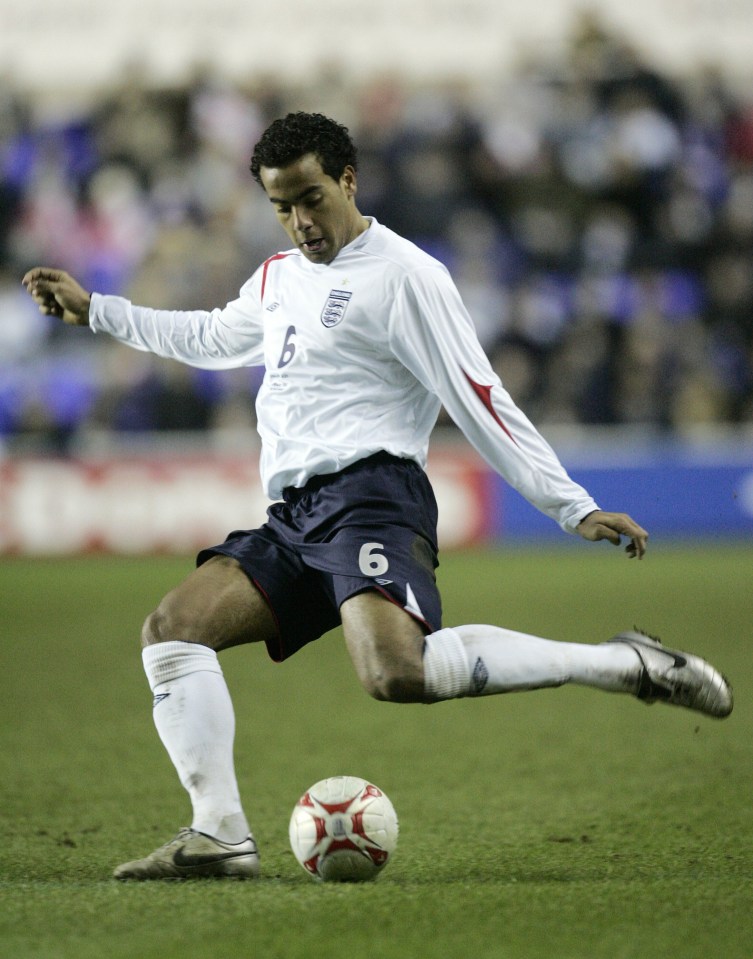 The midfielder was capped four times for England